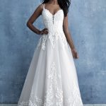 ballgown features gorgeous appliques and a double spaghetti strap